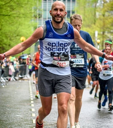 <p>Ryan Tindall – who will run the Manchester Marathon on April 14 – has come a long way since waking up in an ambulance following a seizure in 2011</p>