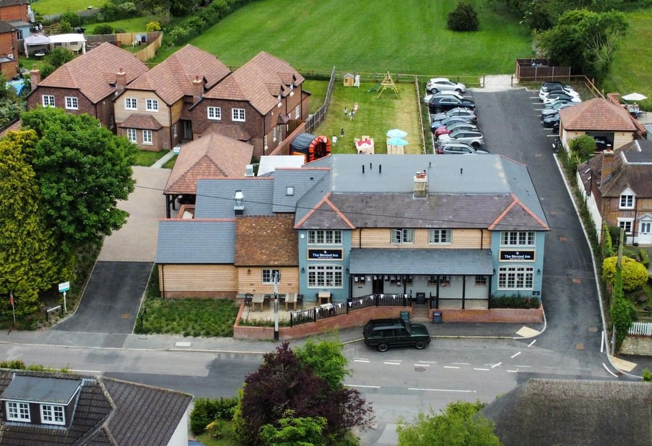 <p>The Binsted Inn as seen from the air</p>