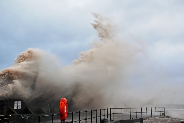 Huge waves were driven onto the harbour defences in Watchet.