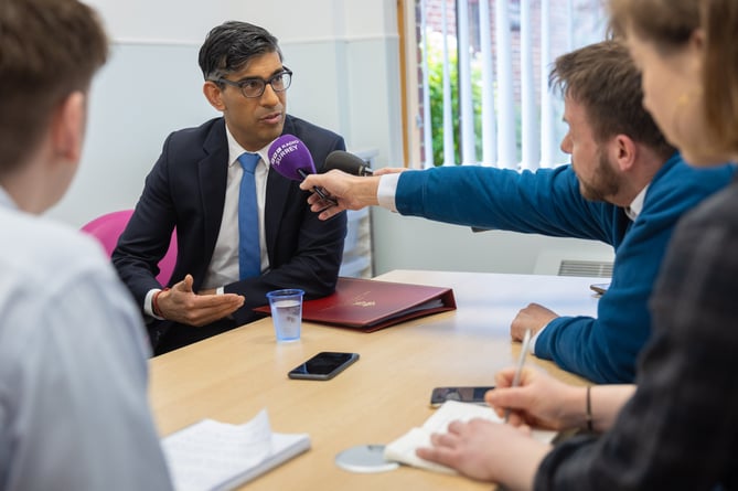 11/04/2024. Woking, United Kingdom. The Prime Minister Rishi Sunak visits Woking Community Hospital where he met staff and spoke with a patient having a bone diagnostic test in the Community Diagnostic Centre. Picture by Simon Walker / No 10 Downing Street