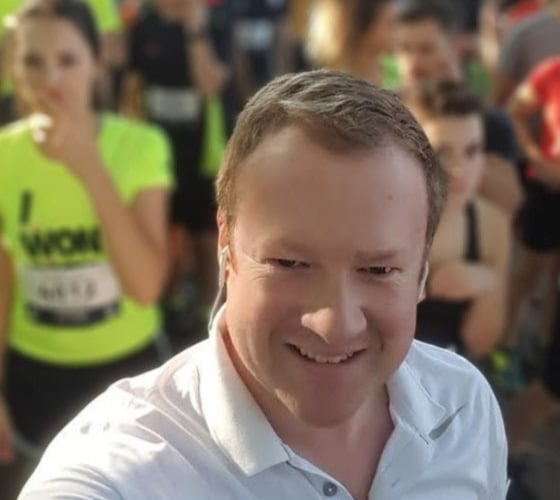 Gregory Stafford with marathon runners.