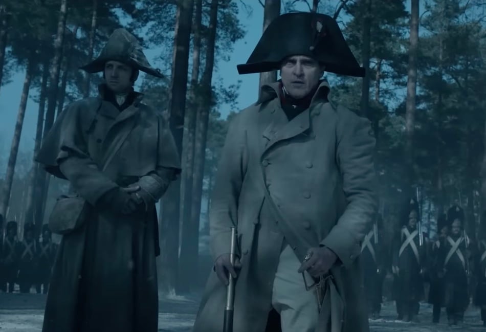 <p>Battle scenes in Ridley Scott's Napoleon, starring Joaquin Phoenix, were shot at Bourne Woods near Farnham (Photo: Apple Studios)</p>