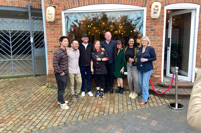 Former MasterChef contestants join judge Gregg Wallace and 2023 winner Chariya outside her new Khao Soi restaurant in Cross and Pillory Lane, Alton