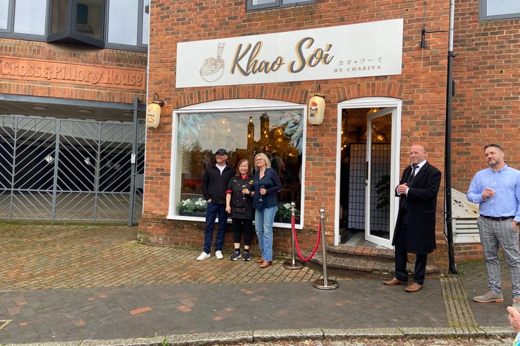 MasterChef judge Gregg Wallace with 2023 winner Chariya and 2016 winner Jane Devonshire outside Chariya's new Khao Soi restaurant in Cross and Pillory Lane, Alton