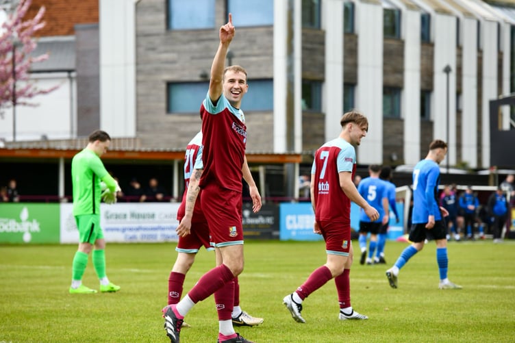Mark Waters celebrates Farnham Town's opening goal against Colliers Wood United
