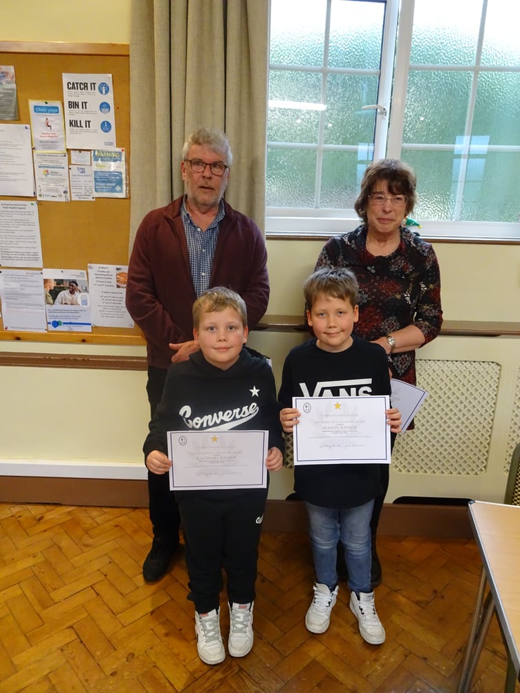 Young Zachary and Mason Bassoe of Trewoon were congratulated at the presentation. Picture: St Mewan Parish Council