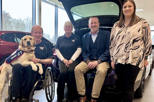 Dealership welcomes driving force behind East Hampshire canine charity
