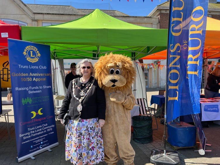 Truro mayor Cllr Carol Swain and the Truro Lions mascot at Truro Volunteers Day