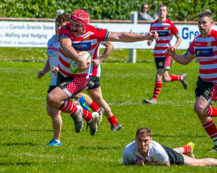 Alex Welland breaks through the Camborne Crusaders defence.