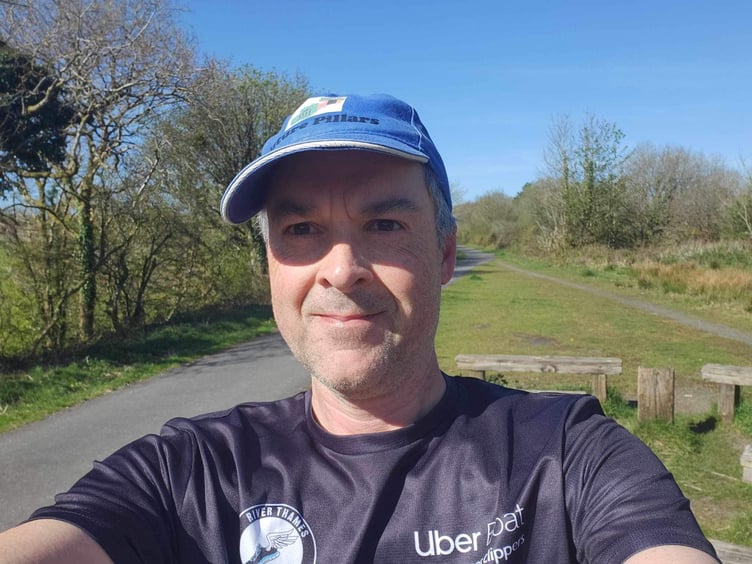 Peter McAughey, who ran 26.2 miles of the Granite Way on the same day.