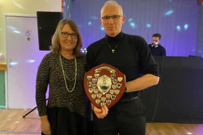 Chris Gill receives the Steve Parker Award from Nicola O'Connor