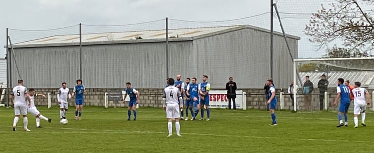 St Austell skipper lines up a free-kick early on at Pennygillam.