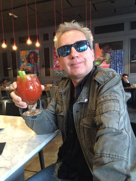 Terry a Phyllis Tuckwell patient enjoying a drink 
