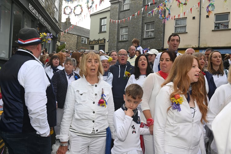 The Blue Oss supporters make their way through the town. (Picture: Adrian Jasper)