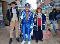 Town crier's royal announcement to bank holiday shoppers