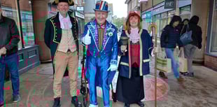 Town crier's royal announcement to bank holiday shoppers