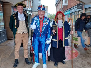 Town crier's royal announcement to bank holiday shoppers