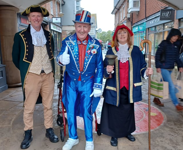 Town crier's royal announcement to bank holiday shoppers