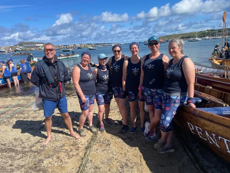 The Lady Super Vets team coxed by Phoebe Millar.