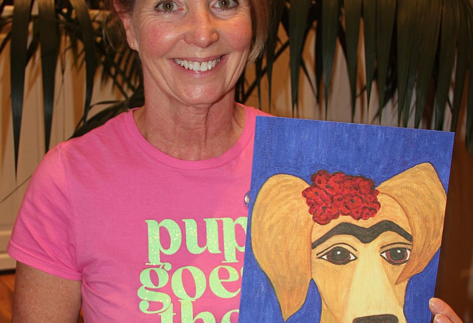 <p>Alison Molan with one of her artworks (Farnham Maltings)</p>