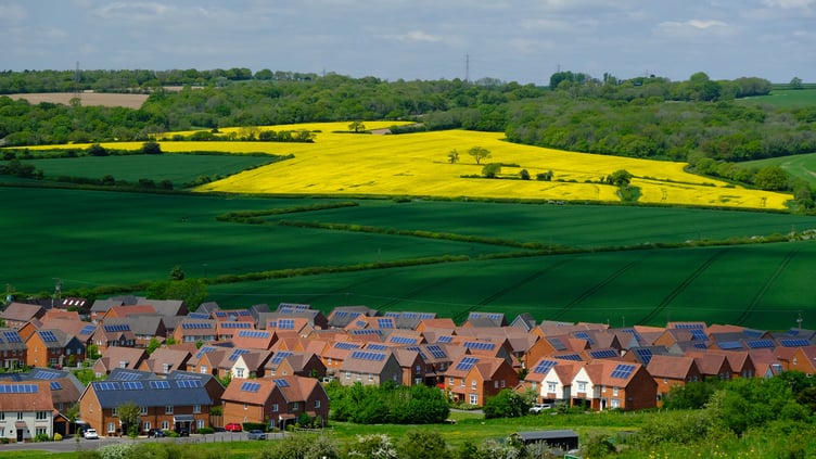 Solar panels on houses in Clanfield, May 2024.