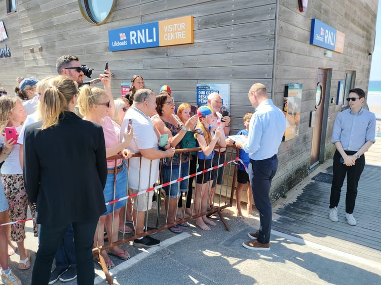 Prince William meets members of the public outside the RNLI visitor centre