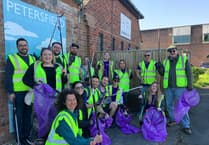 Society benefits as volunteers from Liphook firm clean up the streets of Petersfield