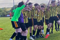 School football team shows resilence to come from behind to win cup