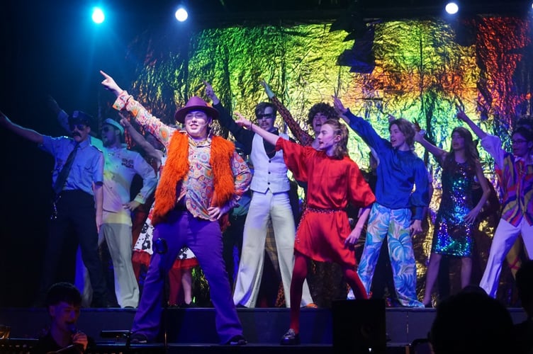 The cast of Twelfth Night Fever perform Night Fever 