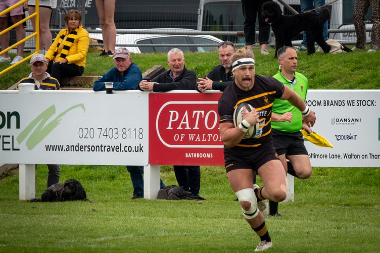 Former Bude centre Duncan Tout, who plays for Tonbridge Juddians in Kent, is about to score the game's third try.