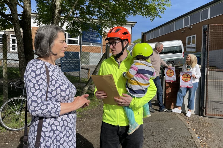 Alex Just talks to parents at Farnham Heath End School, May 2024.