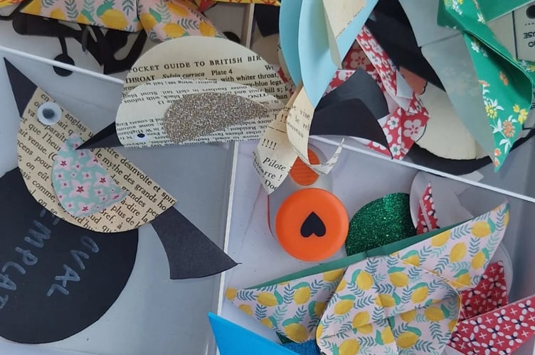 The children's birds, bugs and butterflies were made out of second hand books from Oxfam