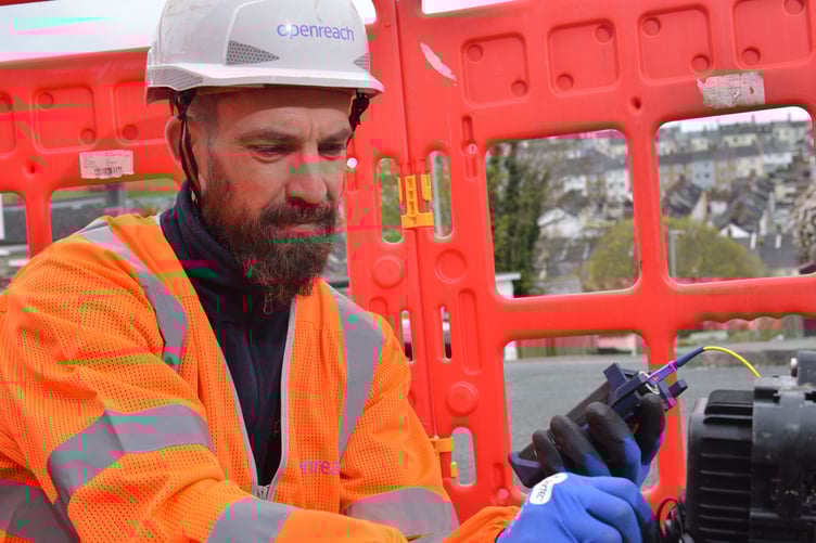 An Openreach engineer at work installing full fibre