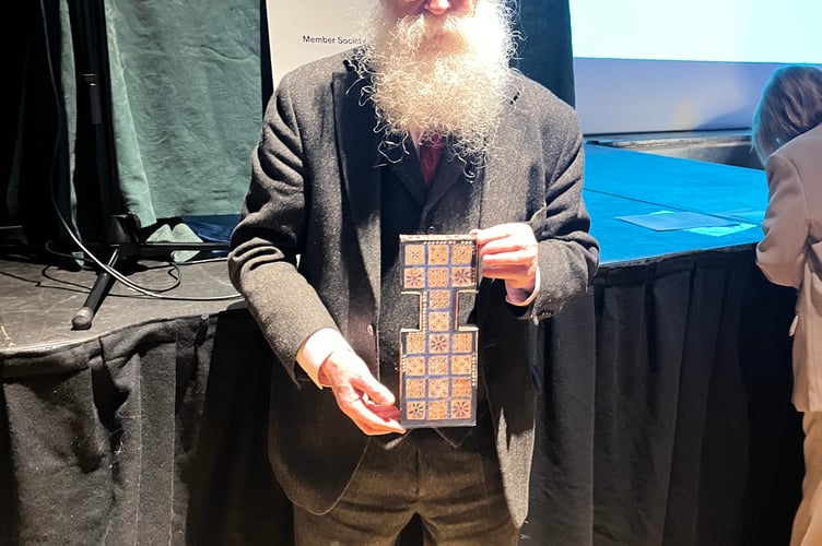 Irving Finkel, lecturer to The Arts Society Farnham, with the board for the game of Ur, May 21st 2024.