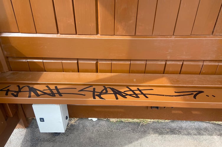 The graffiti at the bus stop is constant and changes each time