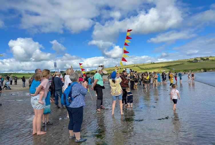 Some of the campaigners went into the sea to protest against the proposed desalination plant.