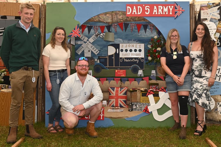 Receiving first prize for their cubicle display in the Young Farmers' Club (YFC) marquee are members of the Wadebridge YFC with their take on 'Dad's Army'. Pictured alongside the display are Ben, Ruby, Hannah and Annabelle