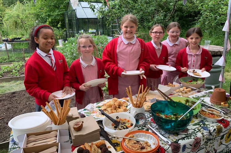 Children enjoying food at Space2Grow