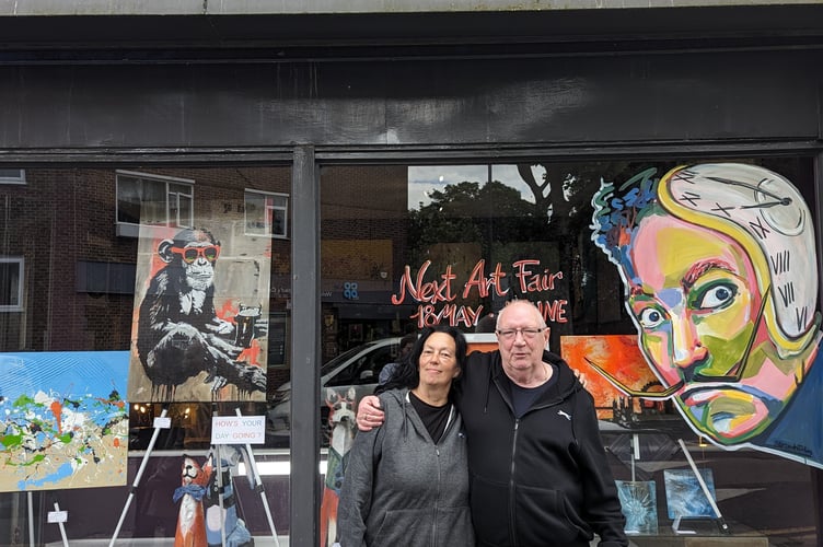 Tanya outside Capital Art Gallery in London with owner Karl Sproat
