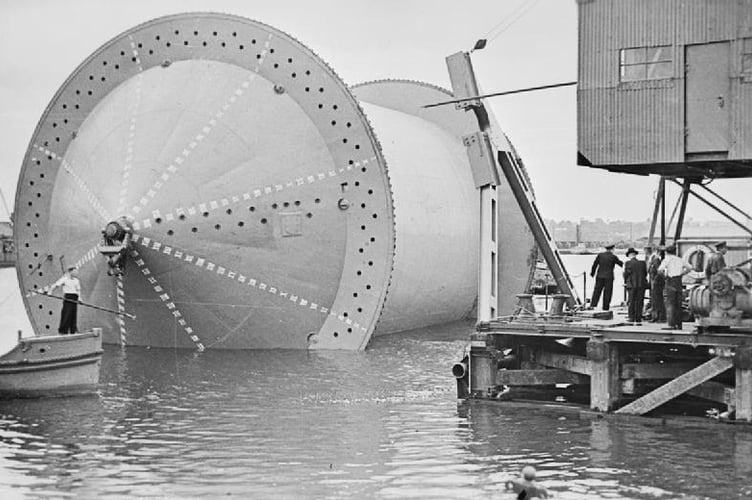 Laying the pipeline: A 'Conundrum', loaded with pipe, ready to be towed across the Channel.