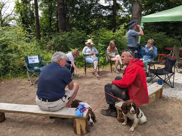VISITORS enjoying a rest and the BBQ
