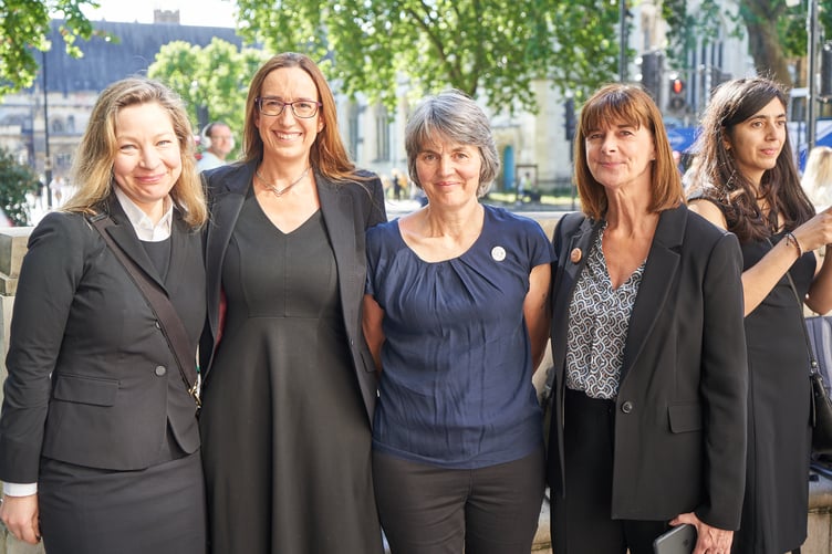 Sarah Finch (centre) with supporters