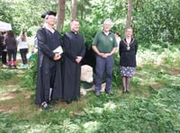 Gimme shelter! Pupils show off building skills in woodland ceremony