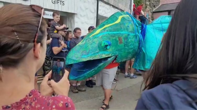 A giant fish attracts attention during Fish Sunday. Picture: James Mustoe