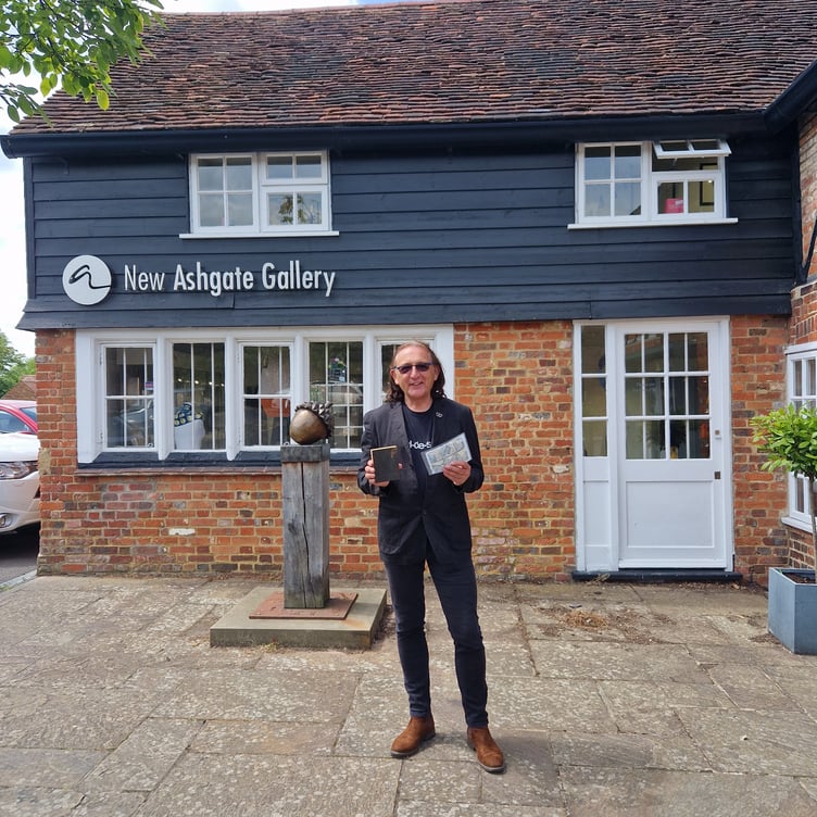 Professor David Dawson Ferry, president of the Royal Society of Painter-Printmakers, New Ashgate Gallery, Farnham, with John Bryce print, July 2024.