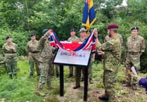 Board dedicated to WWII Liss 'spy school' unveiled near station
