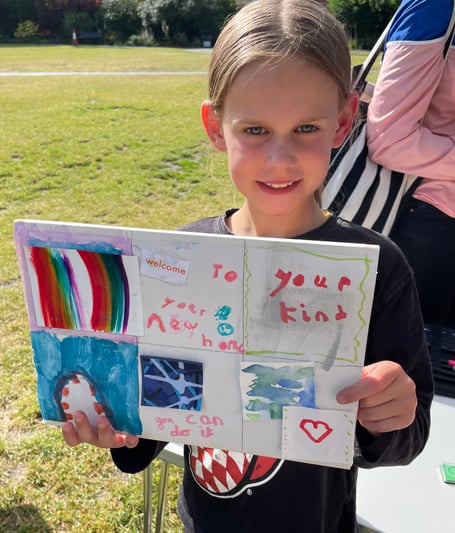 Children create cards to welcome new residents to Brightwells Yard in Farnham, July 2024.