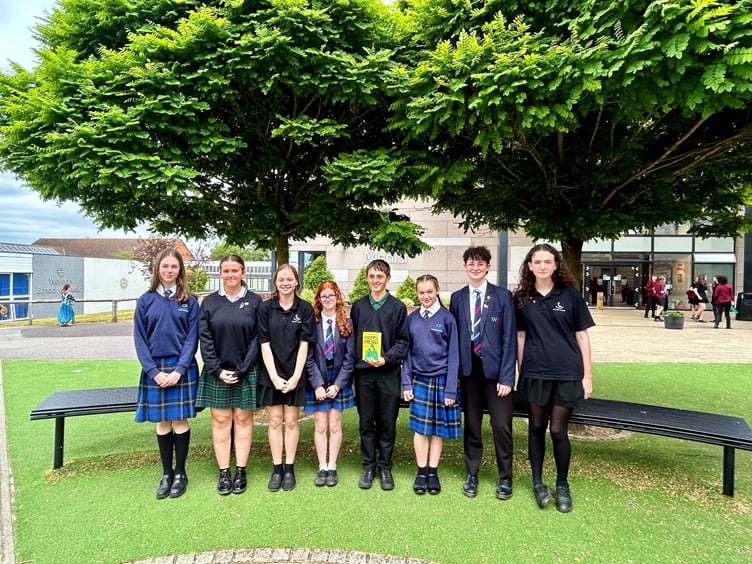 Pupils from schools in the Weydon Multi Academy Trust with a copy of their 2023-24 book award winner, HappyHead by Josh Silver, June 27th 2024.