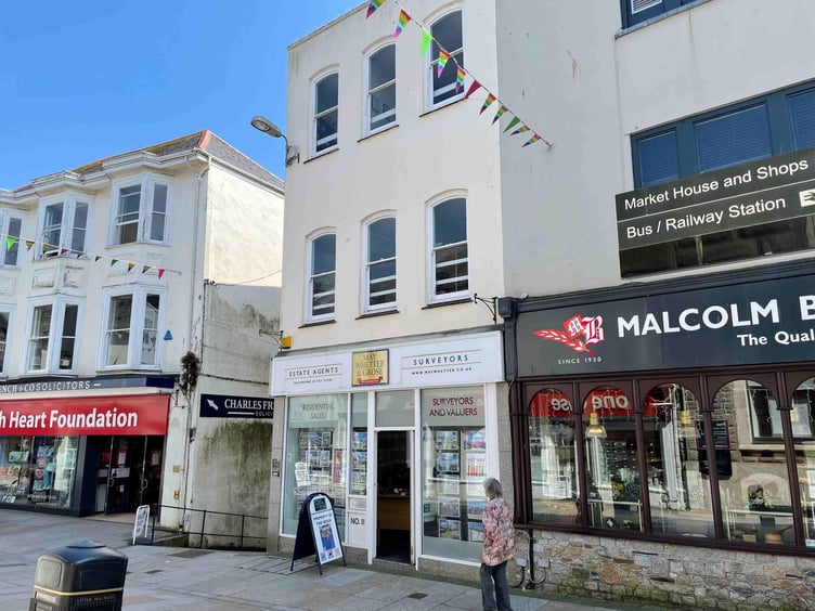 A four-floor commercial building in the centre of St Austell is being auctioned.