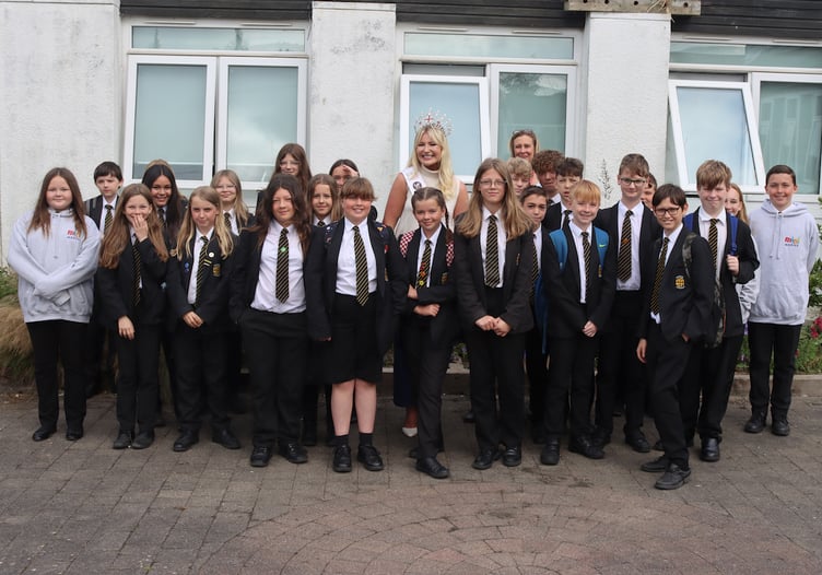 Pupils at Penrice Academy were keen to have a photograph with Miss England.